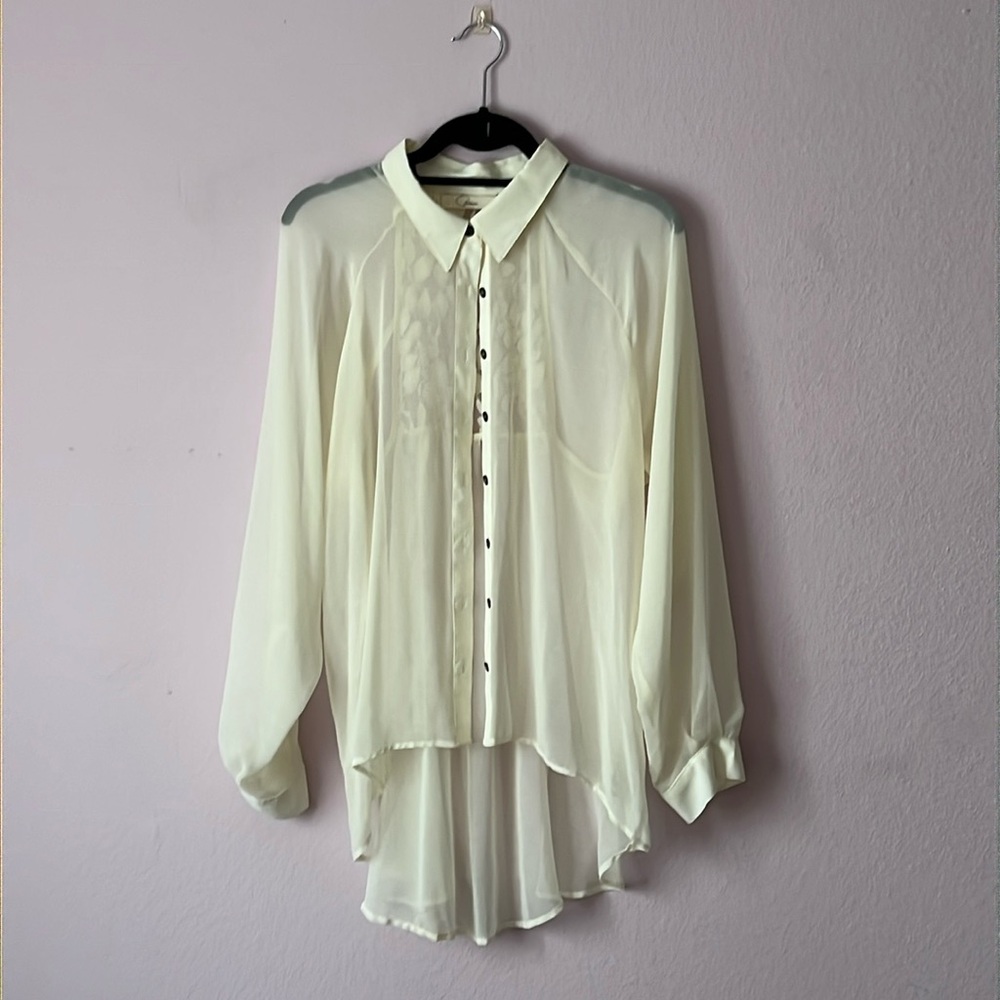 Beautiful sheer blouse with semi open lace back. Off white. Worn only once